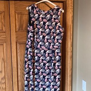 Stylish, Audrey inspired sleeveless dress. Blue and pink details. Fully lined